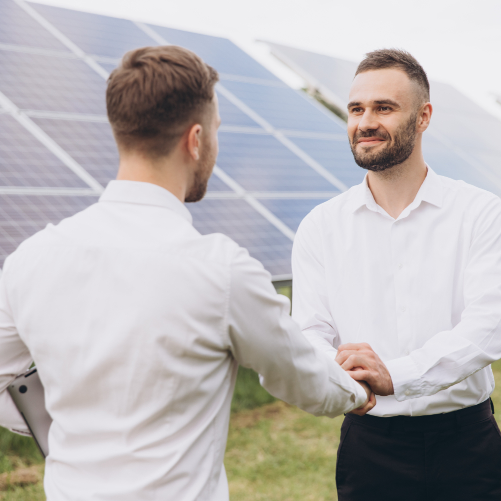 Two Electrical Engineers shaking hands after working to inspect